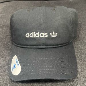 adidas woman black and white cap